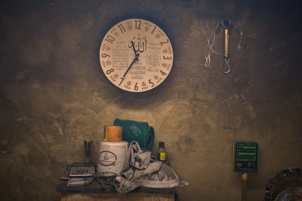A wall clock hangs in the workshop of polishers Yucel and Murat Gur in the Buyukhan artisan quarter in Istanbul, Turkey, Thursday, Aug. 6, 2026. (AP Photo/Francisco Seco)