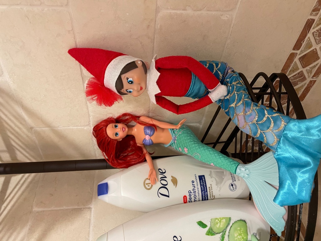 An Elf on the Shelf doll appears with an Ariel doll from Disney's "The Little Mermaid" at the home of Antonia Katsanos in Totowa, N.J. on Dec. 12, 2020. (Antonia Katsanos via AP)