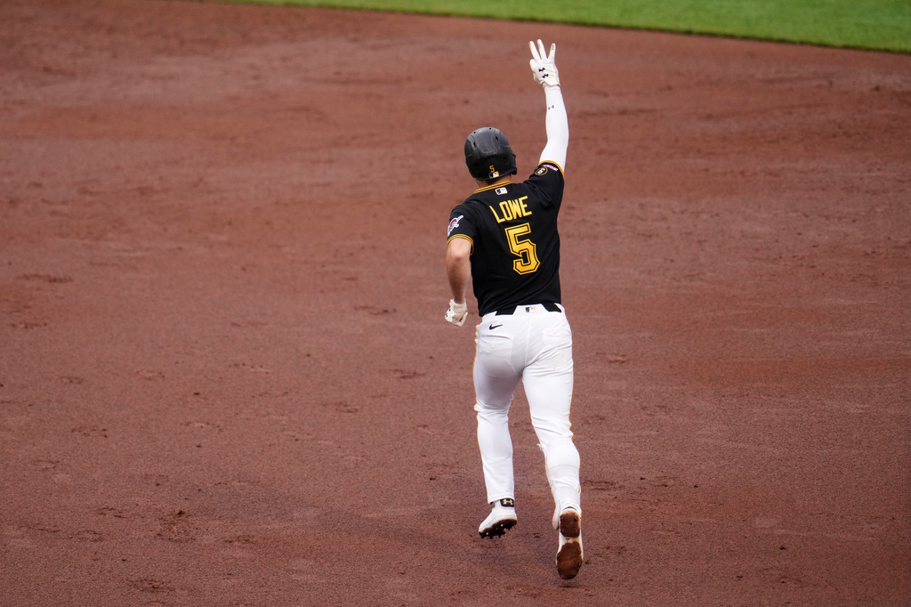 Pittsburgh Pirates' Brandon Lowe (5) rounds the bases after hitting a three-run home runb off Chicago Cubs pitcher Jameson Taillon (50) during the third inning of a baseball game in Pittsburgh, Wednesday, May 27, 2026. (AP Photo/Gene J. Puskar)