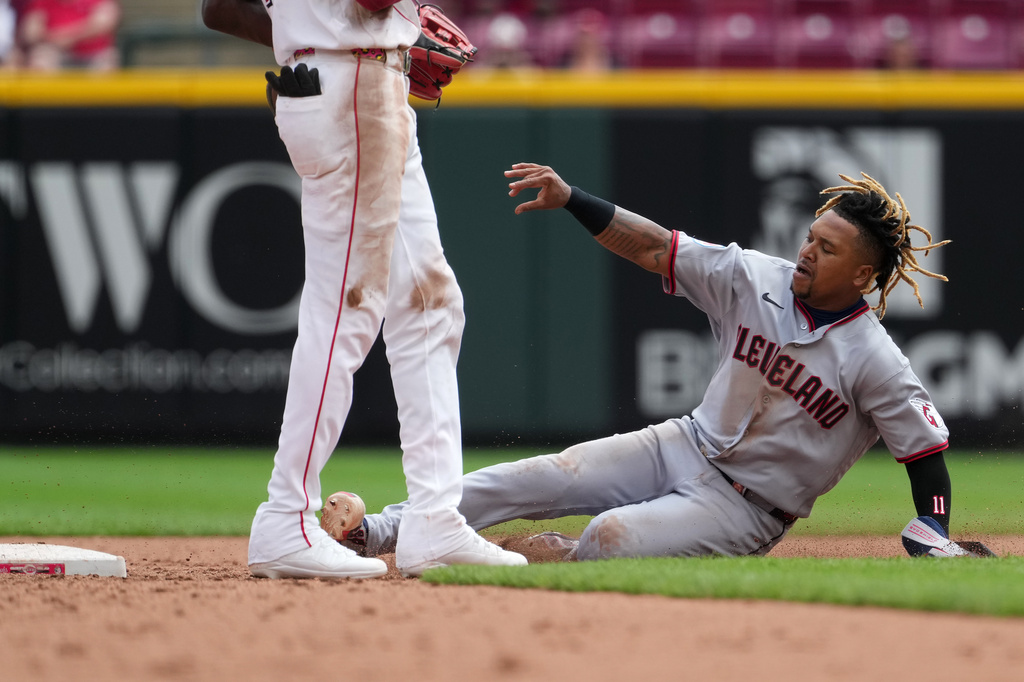 Cleveland Guardians' José Ramírez steals second base during the fifth inning in the first baseball game of a doubleheader against the Cincinnati Reds, Tuesday, July 28, 2026, in Cincinnati. (AP Photo/Kareem Elgazzar)