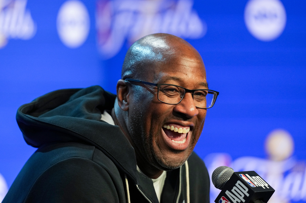 New York Knicks head coach Mike Brown laughs during a news conference prior to the start of the NBA Finals basketball series against the San Antonio Spurs, Tuesday, June 2, 2026, in San Antonio. (AP Photo/Eric Gay)