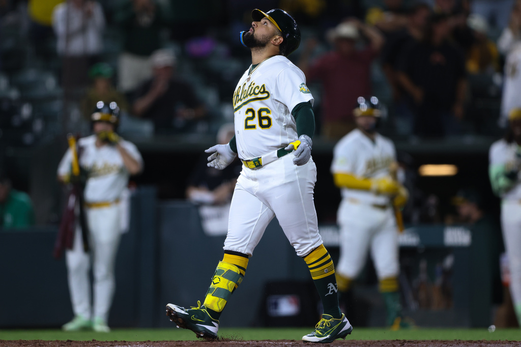 Athletics' Carlos Cortes celebrates after hitting a go ahead two-run home run during the eighth inning of a baseball game against the Los Angeles Angels Tuesday, Sept. 22, 2026, in West Sacramento, Calif. (AP Photo/Scott Marshall)
