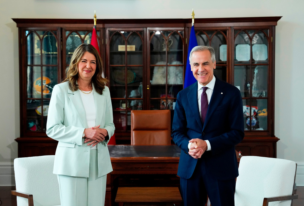 FILE - Prime Minister Mark Carney, right, meets with Premier of Alberta Danielle Smith at his office in Ottawa on Friday, May 8, 2026. (Sean Kilpatrick/The Canadian Press via AP, File)