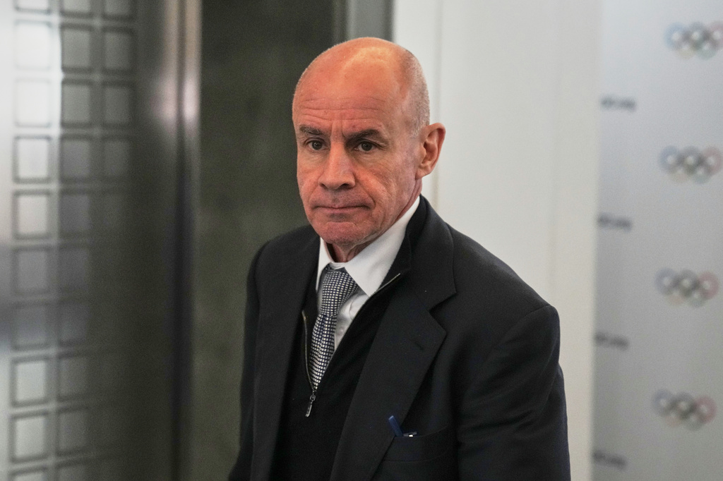 FILE - Candidate to the presidency of the International Olympic Committee Johan Eliasch arrives at the mixed zone during a break of the 144th session, which will elect the new IOC President, in Costa Navarino, western Greece, March 19, 2025. (AP Photo/Thanassis Stavrakis, File)