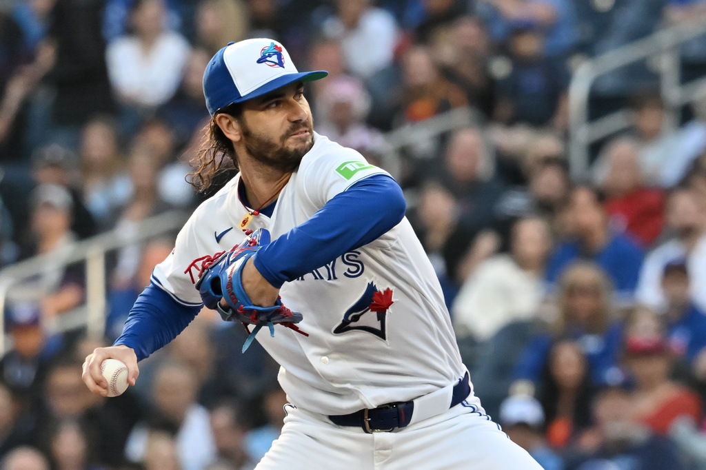 Toronto Blue Jays pitcher Dylan Cease throws to a Houston Astros batter during the first inning of a baseball game in Toronto, Monday, June 22, 2026. (Jon Blacker/The Canadian Press via AP)
