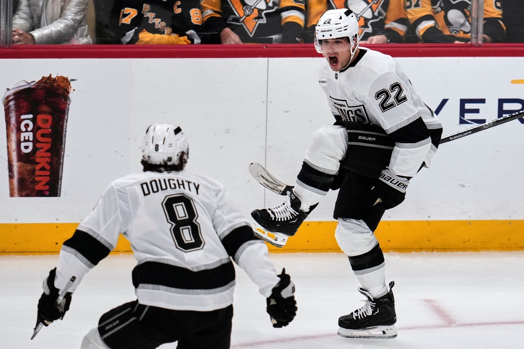 Los Angeles Kings' Kevin Fiala (22) celebrates after his goal with Drew Doughty during the third period of an NHL hockey game against the Pittsburgh Penguins in Pittsburgh, Sunday, Nov. 9, 2025. (AP Photo/Gene J. Puskar)