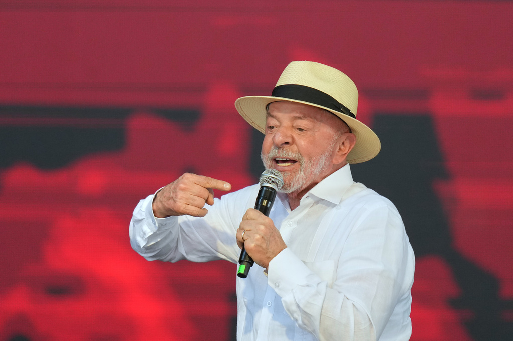 Brazilian President Luiz Inacio Lula da Silva speaks during a meeting with members of the Homeless Workers Movement marking its 30th anniversary in Taboao da Serra, greater Sao Paulo area, Brazil Saturday, Aug. 8, 2026. (AP Photo/Andre Penner)