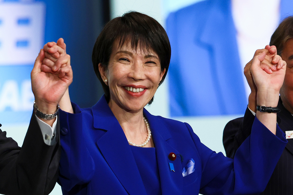 Newly-elected leader of Japan's Liberal Democratic Party (LDP) Sanae Takaichi celebrates after winning the LDP leadership election in Tokyo, Japan, Saturday, Oct. 4, 2025. (Kim Kyung-Hoon/Pool Photo via AP)