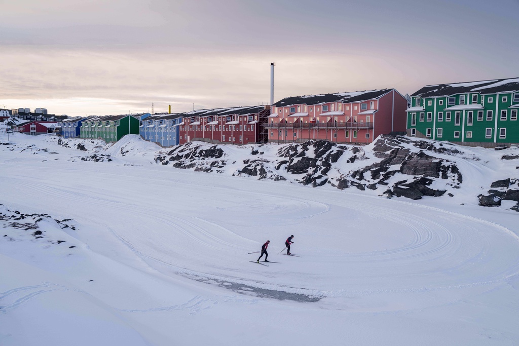Cross-country skiers train in Nuuk, Greenland, Wednesday, Jan. 14, 2026. (AP Photo/Evgeniy Maloletka)