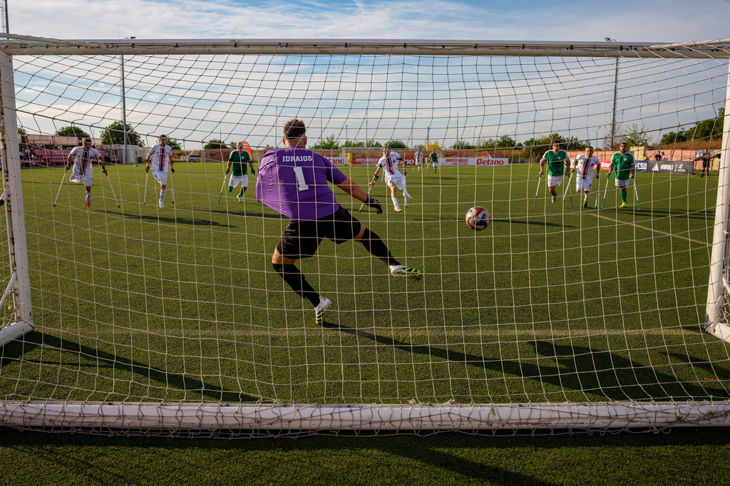 FCSB's Stefan Dogaru scores a goal from a penalty kick during an amputee soccer match between FCSB and Panathinaikos in the inaugural EAFF Conference League in Bucharest, Romania, Friday, Sept. 25, 2026. (AP Photo/Andreea Alexandru)