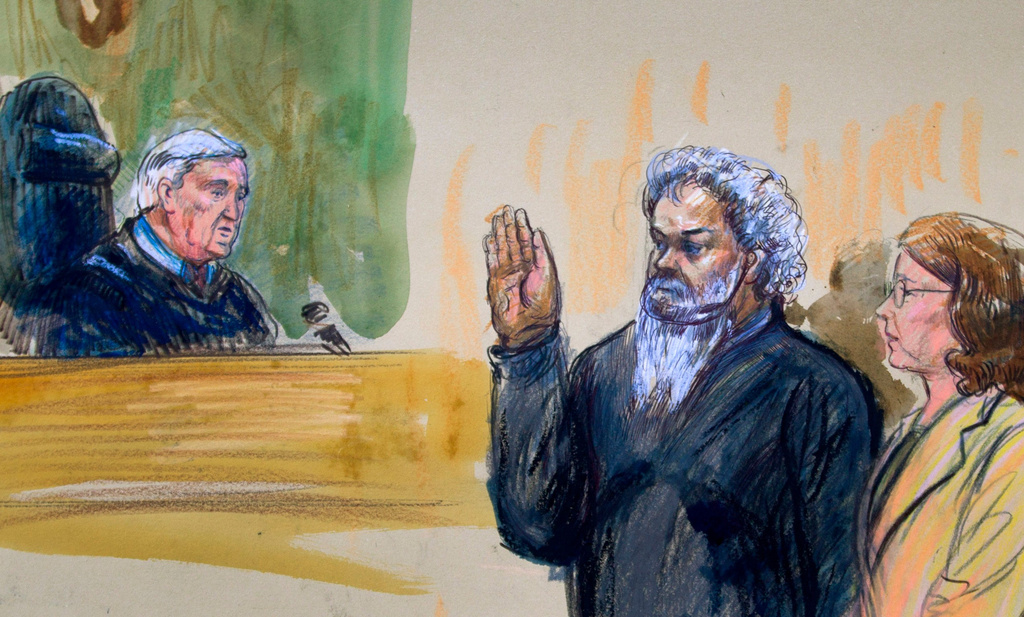 This June 28, 2014, artist's rendering shows United States Magistrate, Judge John Facciola, swearing in the defendant, Libyan militant Ahmed Abu Khatallah, wearing a headphone, as his attorney Michelle Peterson watches during a hearing at the federal U.S. District Court in Washington. (AP Photo/Dana Verkouteren)