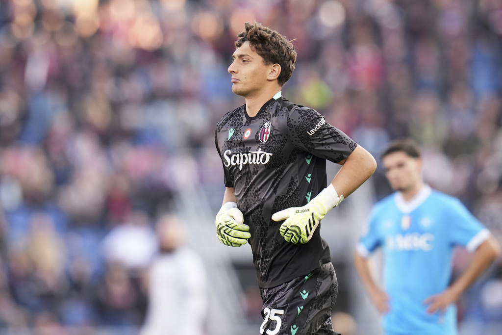 Bologna's goalkeeper Massimo Pessina enters the field during a Serie A soccer match between Bologna and Napoli, in Bologna, northern Italy, Sunday, Nov. 9, 2025. (Massimo Paolone/LaPresse via AP)