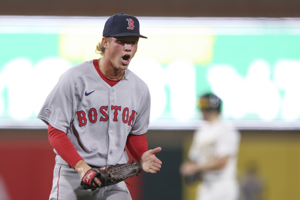 Boston Red Sox starting pitcher Connelly Early reacts after the final out of the third inning of a baseball game as he makes his MLB Debut against the Athletics, Tuesday, Sept. 9, 2025, in West Sacramento, Calif. (AP Photo/Scott Marshall)