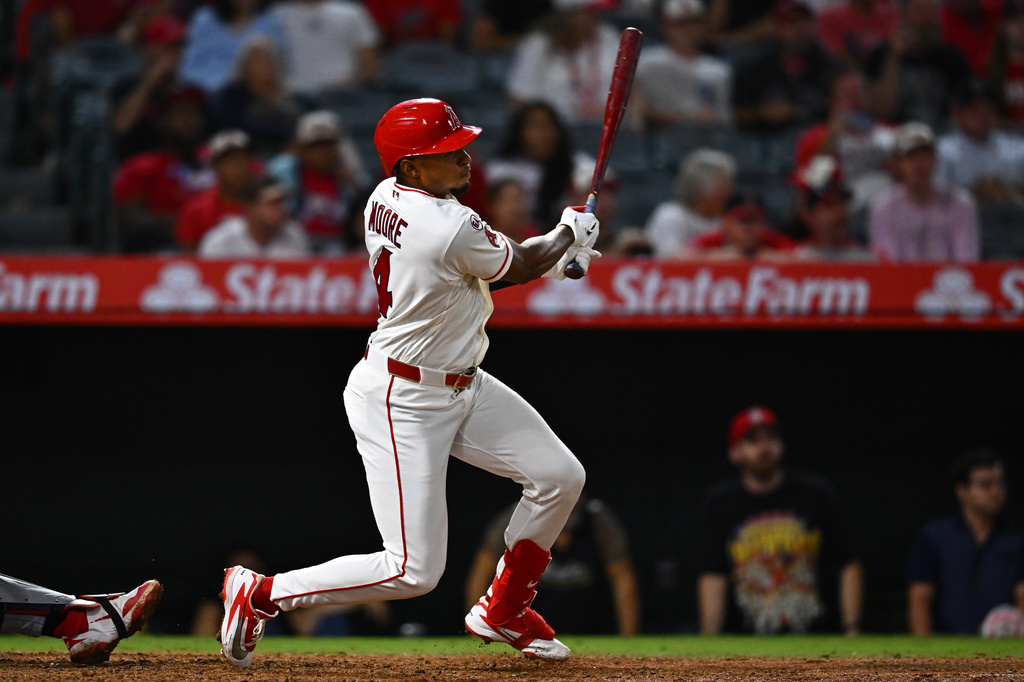 Los Angeles Angels' Christian Moore hits a walk off single during the 11th inning of a baseball game against the Minnesota Twins, Saturday, Sept. 19, 2026, in Anaheim, Calif. (AP Photo/William Liang)