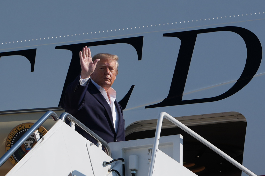 President Donald Trump waves as he boards Air Force One, Tuesday, Oct. 27, 2026, at Joint Base Andrews, Md. (AP Photo/Alex Brandon)