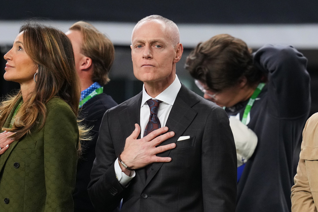 Big 12 Commissioner Brett Yormark stands on the sideline during the playing of the national anthem before the first half of a Big 12 Conference championship NCAA college football game between BYU and Texas Tech Saturday, Dec. 6, 2025, in Arlington, Texas. (AP Photo/Julio Cortez)