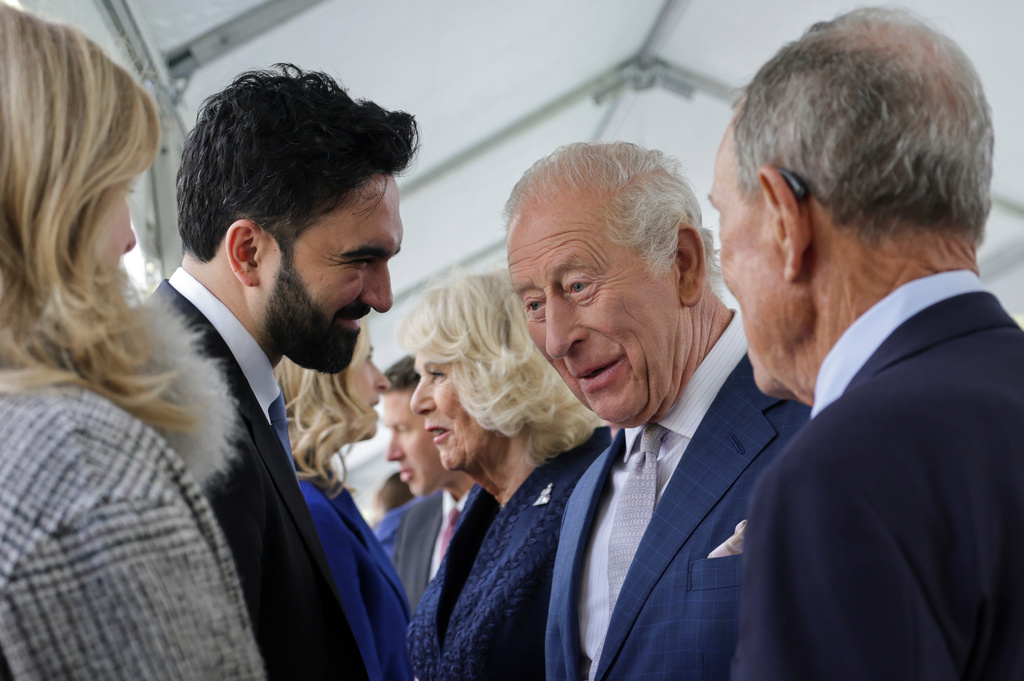 Britain's King Charles III standing next to Queen Camilla interacts with New York City Mayor Zohran Mamdani during a visit to the 9/11 Memorial, in New York, Wednesday, April 29, 2026. (Jeenah Moon/Pool Photo via AP)