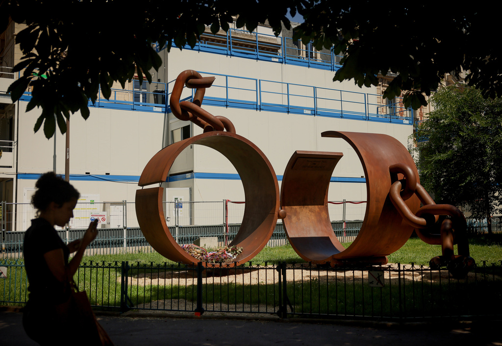 A statue named "Chains," by French artist Driss Sans-Arcidet, honoring the memory of the abolition of slavery, is photographed in a park in Paris, Wednesday, May 27, 2026, as France's National Assembly examines a bill to formally repeal the Code Noir, or Black Code, the 17th-century royal edict that governed slavery in French colonies and treated enslaved people as property. (AP Photo/Thomas Padilla)