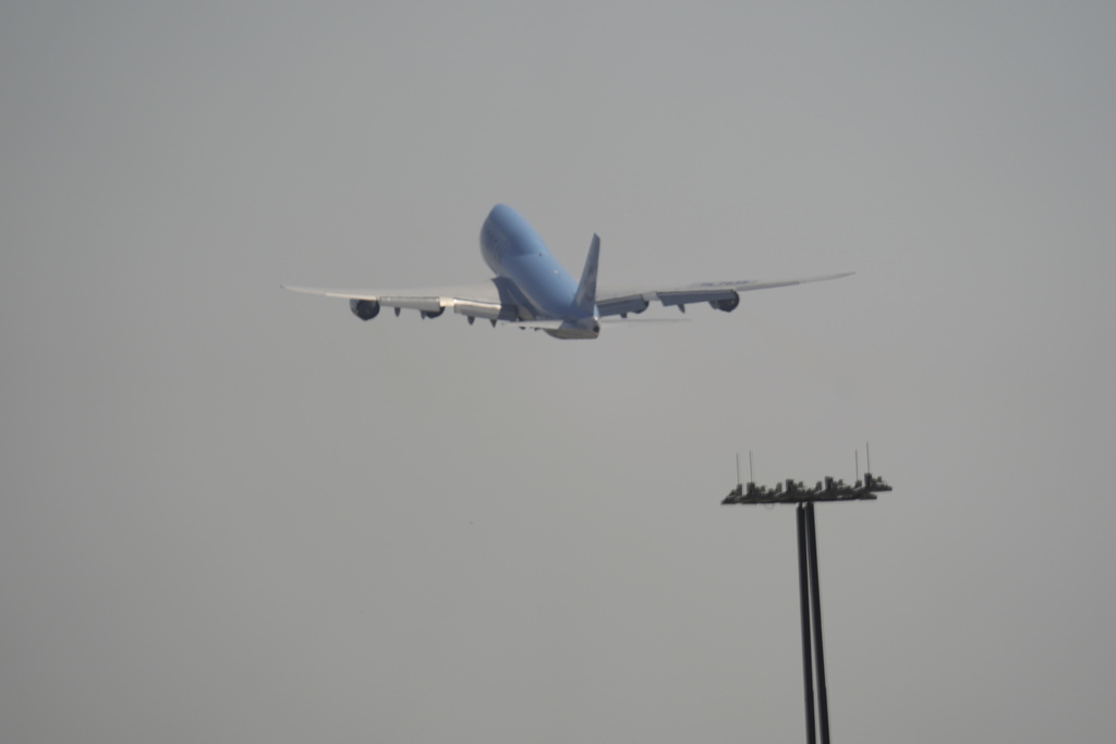 A plane takes off with Korean workers that were detained at Hartsfield-Jackson International Airport in Atlanta, Thursday, Sept. 11, 2025. (AP Photo/George Walker IV)