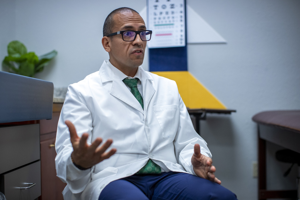 FILE - Pediatric endocrinologist Dr. Hector Granados speaks during an interview at his private practice in El Paso, Texas, Jan. 21, 2025. (AP Photo/Andres Leighton, File)