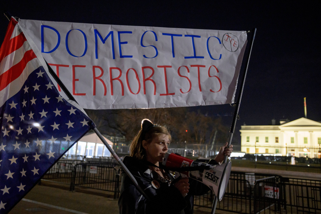 Heather Griffis joins others to protest U.S. Immigration and Customs Enforcement, near the White House, following the fatal shooting of a woman by an Immigration and Customs Enforcement officer in Minneapolis, Thursday, Jan. 8, 2026, in Washington. (AP Photo/Rod Lamkey, Jr.)