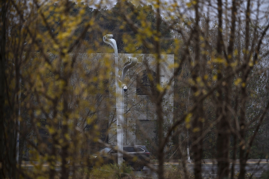 A surveillance camera on a pole is seen from the home of petitioner Yang Guoliang in Changzhou in eastern China's Jiangsu Province, Friday, Dec. 13, 2024. (AP Photo/Ng Han Guan)