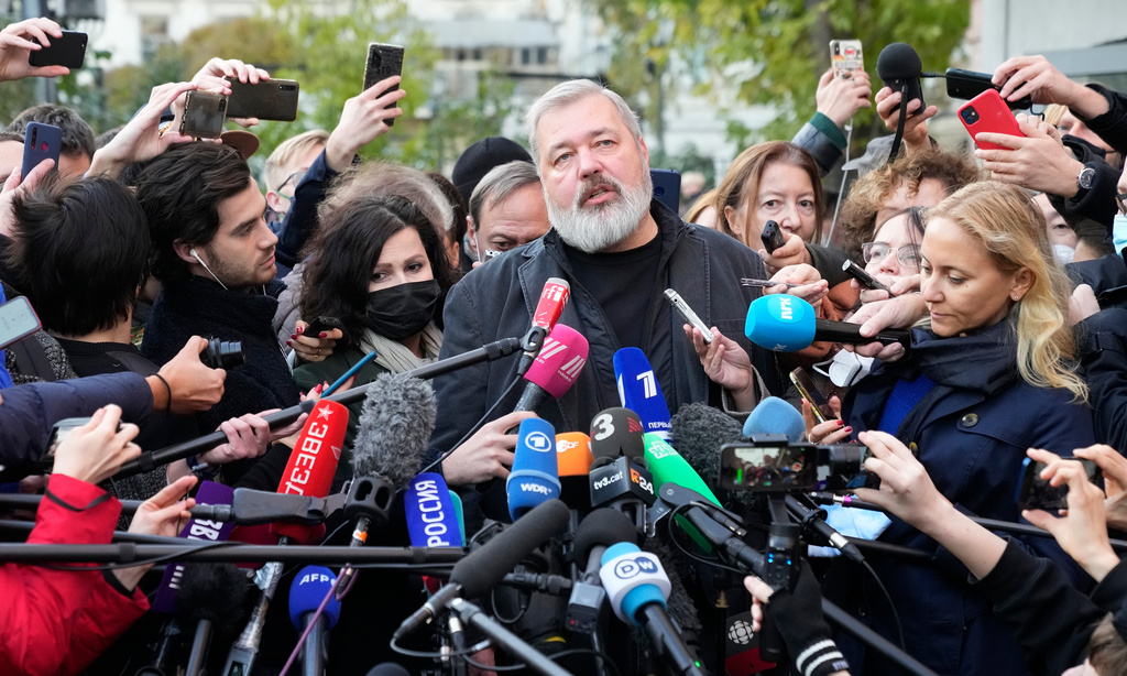 FILE - Novaya Gazeta editor Dmitry Muratov talks to media at the Novaya Gazeta newspaper, in Moscow, Russia, Friday, Oct. 8, 2021. (AP Photo/Alexander Zemlianichenko, File)