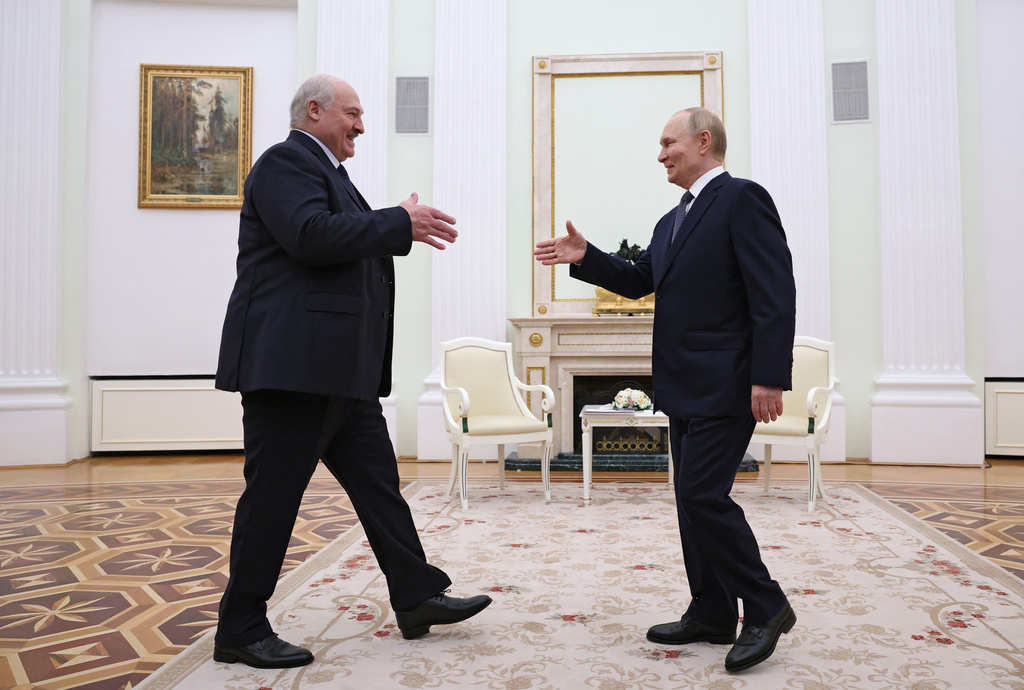 Russian President Vladimir Putin, right, and Belarusian President Alexander Lukashenko shake hands during their meeting a the Kremlin in Moscow, Russia, Friday, Sept. 26, 2025. (Ramil Sitdikov/Pool Photo via AP)
