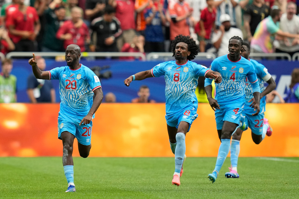 Congo's Yoane Wissa, left, celebrates after scoring his side's first goal during the World Cup Group K soccer match between Portugal and Congo in Houston, Wednesday, June 17, 2026. (AP Photo/Karen Warren)