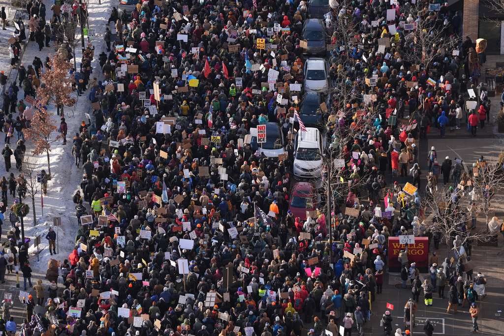 Protesters gather Friday, Jan. 23, 2026, in downtown Minneapolis. (AP Photo/Abbie Parr)
