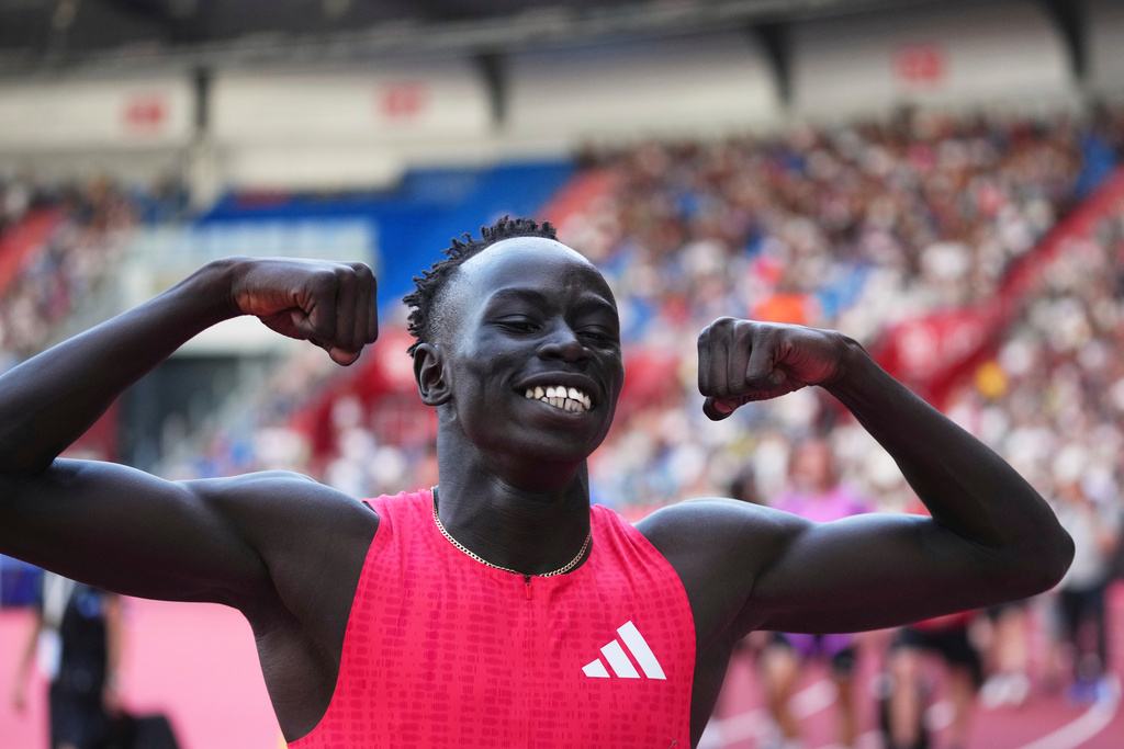 FILE - Gout Gout of Australia, celebrates after winning the men 200 meters during the Ostrava Golden Spike athletics meet in Ostrava, Czech Republic, on June 24, 2025. (AP Photo/Petr David Josek, File)