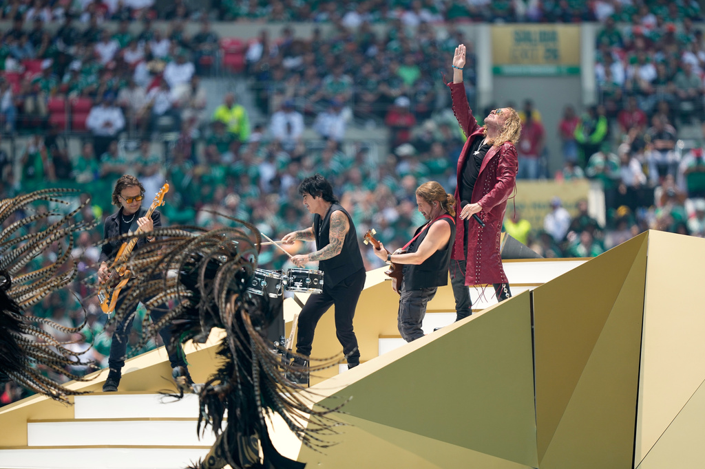 Mexican pop rock band Mana perform before the start of the World Cup Group A soccer match between Mexico and South Africa in Mexico City, Thursday, June 11, 2026. (AP Photo/Natacha Pisarenko)