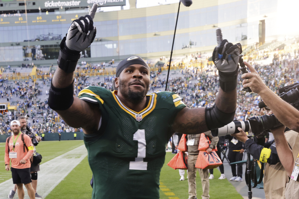 Green Bay Packers defensive end Micah Parsons (1) celebrates after an NFL football game against the Detroit Lions Sunday, Sept. 7, 2025, in Green Bay, Wis. (AP Photo/Mike Roemer)