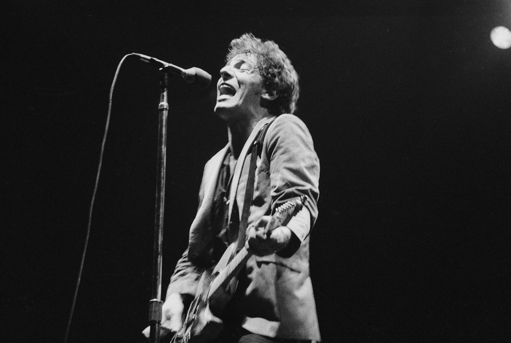 FILE - Bruce Springsteen performs in New York on Aug. 21, 1978. (AP Photo/Jim Pozarik, File)