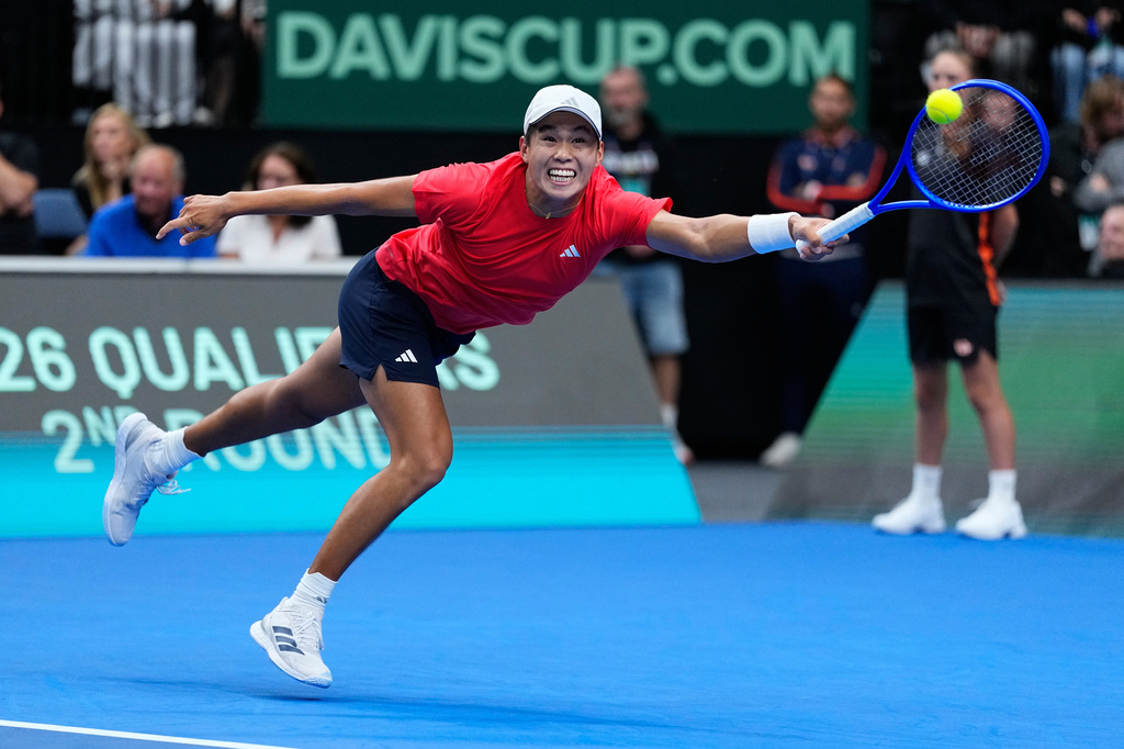 United States' Learner Tien returns the ball to Czechia's Jiri Lehecka during the Davis Cup second round qualifier match between the Czech Republic and the United States, in Prague, Saturday, Sept. 19, 2026. (AP Photo/Petr David Josek)