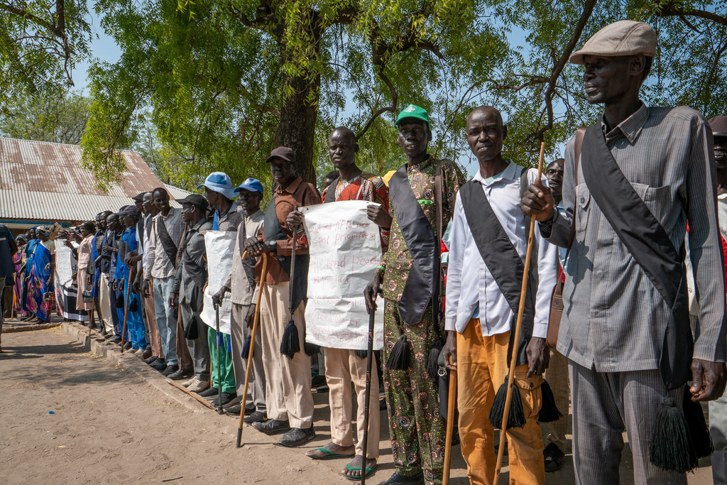 Traditional leaders line up to receive Tom Fletcher, the U.N. under-secretary-general for humanitarian affairs and head of OCHA, in Akobo, Jonglei state, South Sudan, Saturday, Feb. 21, 2026. (AP Photo/Florence Miettaux)