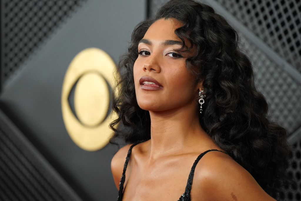 Olivia Dean arrives at the 68th annual Grammy Awards on Sunday, Feb. 1, 2026, in Los Angeles. (Photo by Jordan Strauss/Invision/AP)