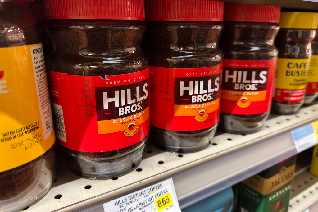 Coffee is displayed for sale at a grocery store Wednesday, April 29, 2026, in Chicago. (AP Photo/Erin Hooley)