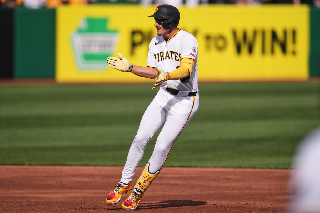 Pittsburgh Pirates' Konnor Griffin celebrates as he rounds second after hitting an RBI double, his first Major League career hit and run, during the second inning of a baseball game against the Baltimore Orioles in Pittsburgh, Friday, April 3, 2026. (AP Photo/Gene J. Puskar)