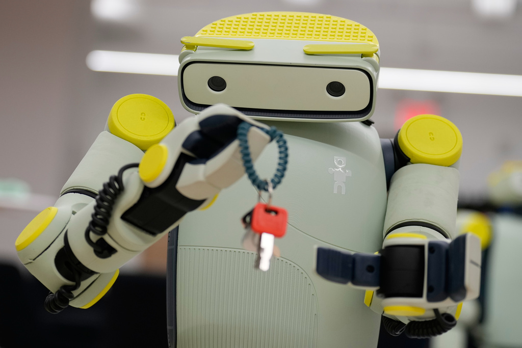 While being operated remotely, Fauna Robotics' new robot named Sprout shows off its dexterity in New York, Wednesday, Jan. 14, 2026. (AP Photo/Seth Wenig)