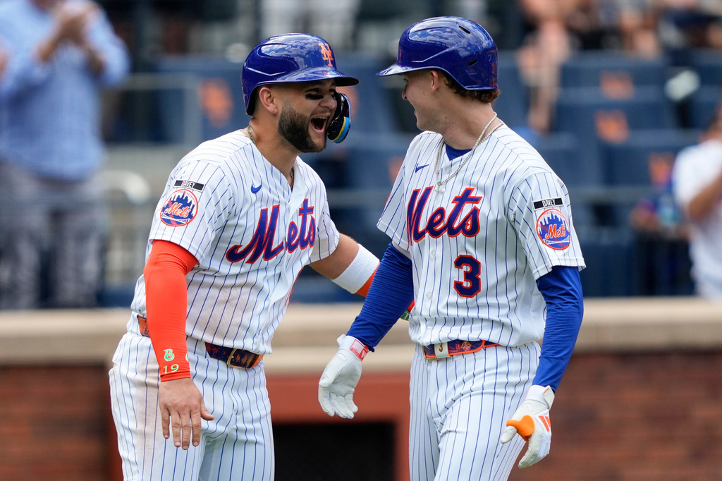 New York Mets' Carson Benge (3) celebrates with Bo Bichette after hitting a two-run home run during the fourth inning of a baseball game against the San Diego Padres, Wednesday, Aug. 19, 2026, in New York. (AP Photo/Yuki Iwamura)