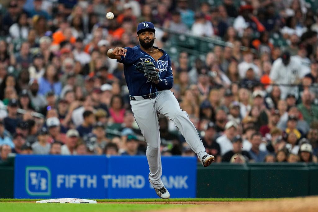 Tampa Bay Rays third baseman Junior Caminero throws for an out on a Detroit Tigers' Dillon Dingler ground ball during the fifth inning of a baseball game Tuesday, Aug. 25, 2026, in Detroit. (AP Photo/Paul Sancya)