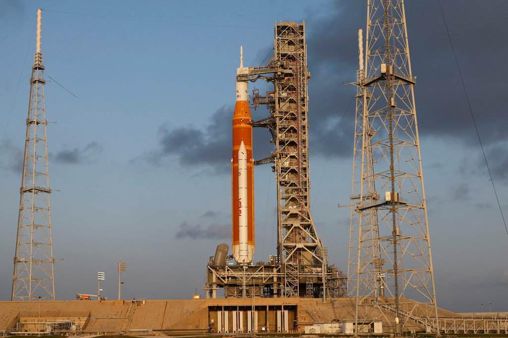 NASA's Artermis II moon rocket sits on Launch Pad 39-B at the Kennedy Space Center at sunrise Sunday, March 29, 2026, in Cape Canaveral, Fla. (AP Photo/Terry Renna)