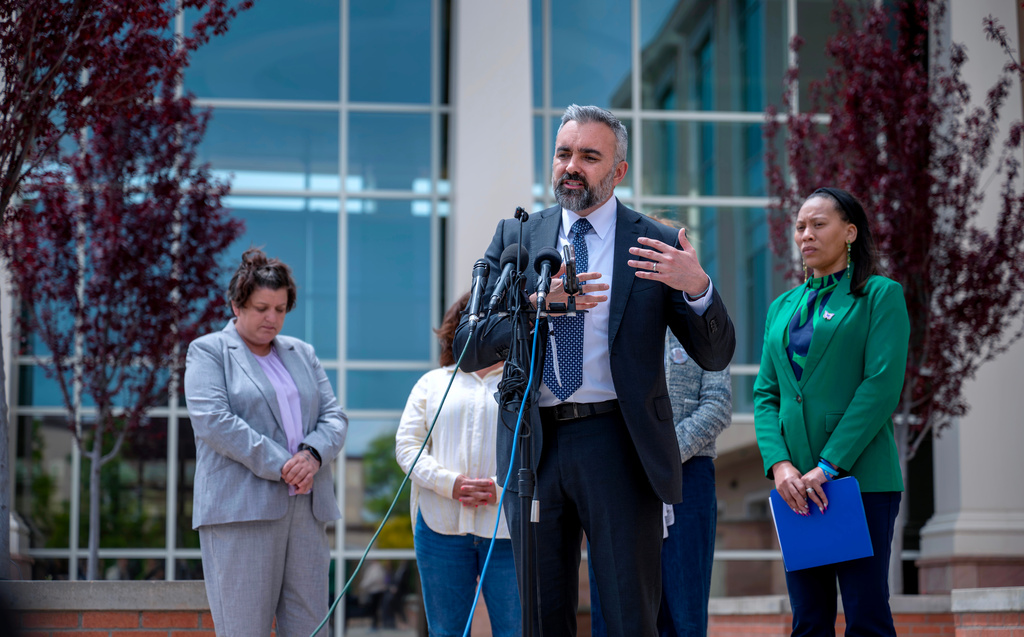 Attorney General Raul Torrez, is joined by a group of mothers advocating for a change to social media, at a news conference outside First District Court, in Santa Fe, N.M., Monday, May 4, 2026. (Eddie Moore/The Albuquerque Journal via AP, Pool)