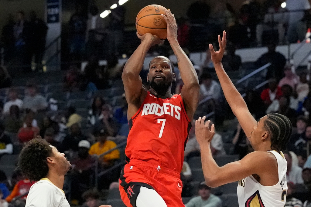 Houston Rockets forward Kevin Durant (7) shoots against the New Orleans Pelicans during the first half of an NBA preseason basketball game, Tuesday, Oct. 14, 2025, in Birmingham, Ala. (AP Photo/Mike Stewart)