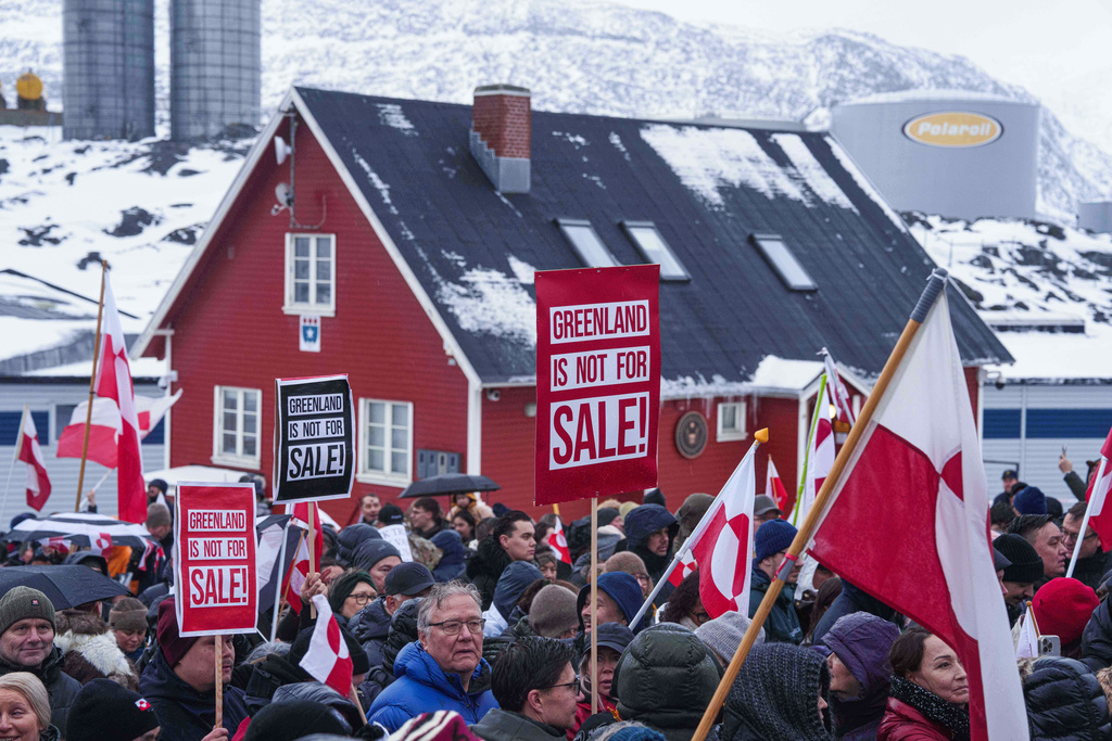 FILE - People protest against President Donald Trump's policy towards Greenland in front of U..S consulate in Nuuk, Greenland, Jan. 17, 2026. (AP Photo/Evgeniy Maloletka, File)