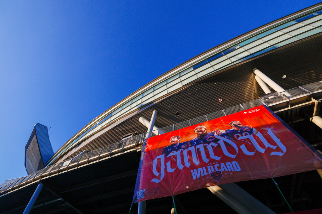FILE - A sign hangs outside the Chicago Bears' Soldier field before an NFL divisional playoff football game against the Green Bay Packers, Saturday, Jan.10, 2026, in Chicago.(AP Photo/Jeffrey Phelps, File)