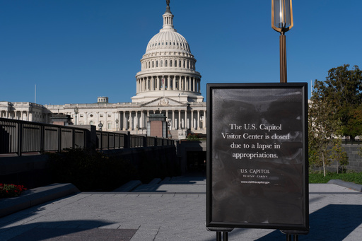 With the government shutdown now in its third week, a sign turns away tourists at the entrance to the Capitol Visitor Center, in Washington, Wednesday, Oct. 15, 2025. (AP Photo/J. Scott Applewhite) With the government shutdown now in its third week, a sign turns away tourists at the entrance to the Capitol Visitor Center, in Washington, Wednesday, Oct. 15, 2025. (AP Photo/J. Scott Applewhite)