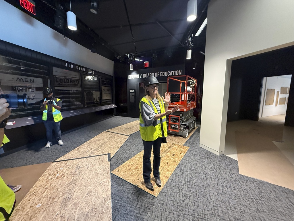Jill Savitt, president and CEO of The National Center for Civil and Human Rights, describes the museum's expansion during a hard-hat tour, Wednesday, Sept. 10 in Atlanta. (AP Photo/Michael Warren)