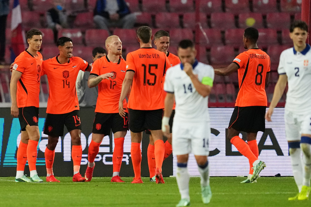 Netherlands' Mexx Meerdink, 3rd left, celebrates with his teammates after scoring the opening goal from the penalty spot during the Nations League soccer match between Serbia and the Netherlands in Belgrade, Serbia, Sunday, Sept. 27, 2026. (AP Photo/Darko Vojinovic)